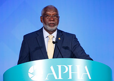 David Satcher at lectern