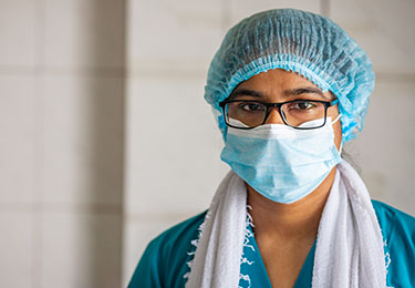 Woman health worker in mask