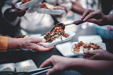 Food being served at a food pantry