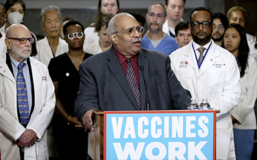 APHA leader Georges Benjamin speaks at a news conference in Washington, D.C.