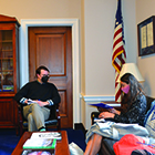 A student talks to a congressional staffer about climate policy