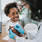 Girl receives an MMR vaccination